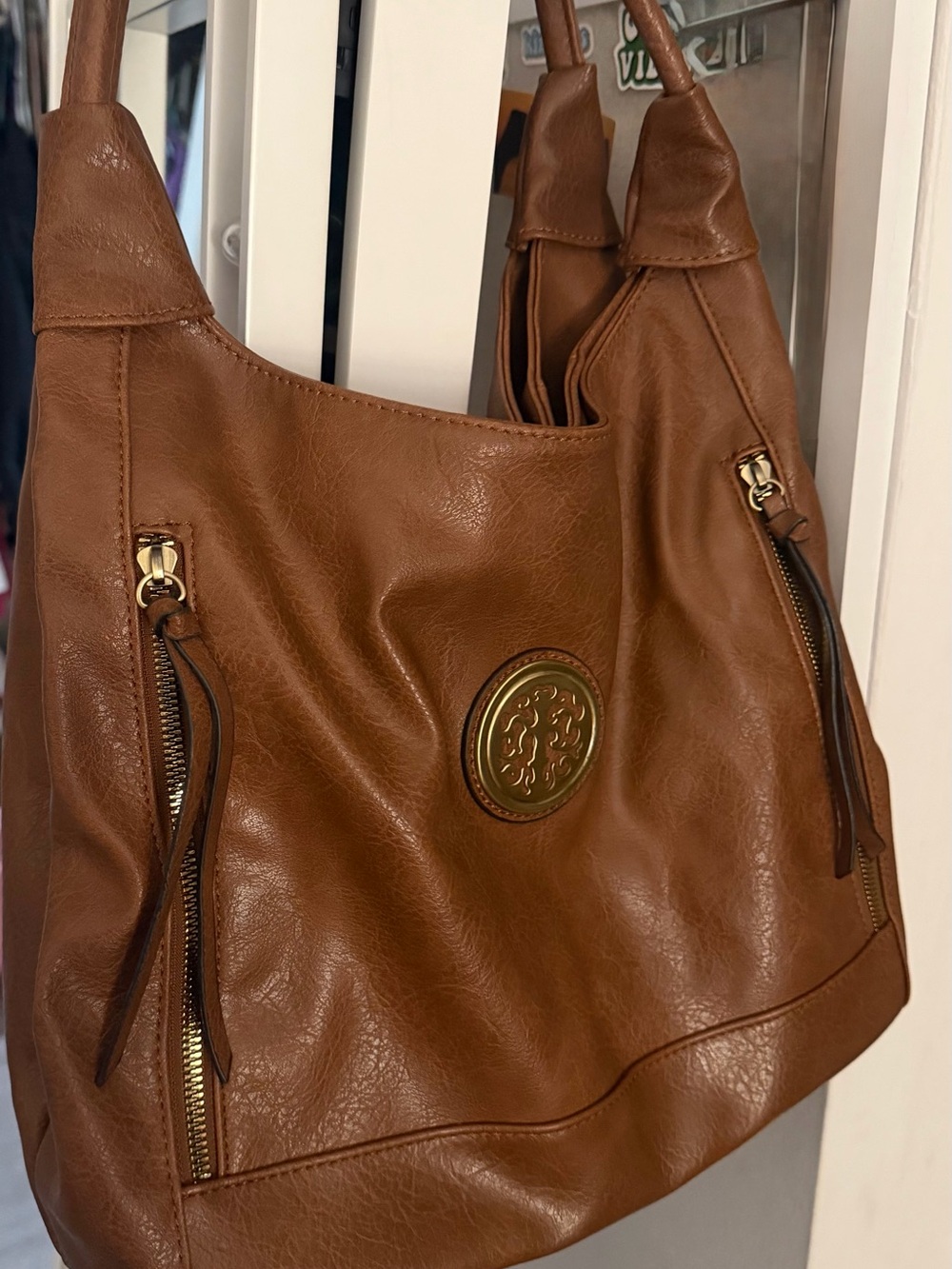 Tan Shoulder Bag with Gold Medallion Accent